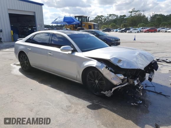 ✅ 2012 Audi A8 • VIN: WAURVAFD7CN018461 • Lot: 93071705. Wystawiony na Copart z przebiegiem 146 036 mil. Bezpłatny archiwum sprzedaży aukcyjnych z USA i szczegółowy raport historii pojazdu na DreamBid. Zdjęcie 4.