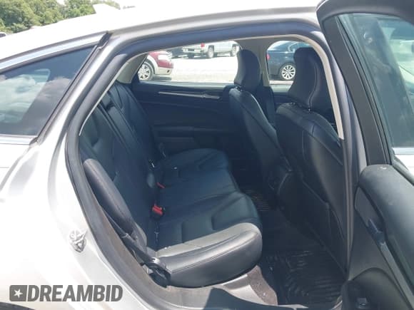 ✅ 2019 Ford Fusion Titanium • VIN: 3FA6P0K94KR253669 • Лот: 42861475. Опубликован ранее на IAAI с пробегом 88 617 миль. Бесплатный доступ к архиву аукционных продаж из США и подробный отчёт об истории автомобиля на DreamBid. Изображение 8.