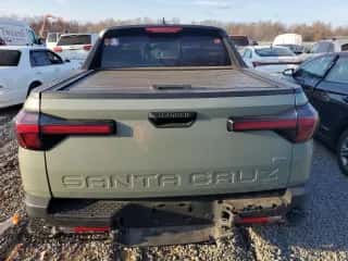 2023 Hyundai Santa Cruz SEL with VIN 5NTJCDAE9PH059267, listed as a Copart auction lot 79508144 with 62,665 mi miles and Salvage title. Bid and sale history available at DreamBid. Image 6.