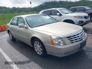 ✅ 2009 Cadillac DTS 1SA • VIN: 1G6KD57Y19U127449 • Lot: 42116152. Listed on IAAI with 107,901 mi. Free auction sales archive from the USA and detailed vehicle history report at DreamBid. Image 1.
