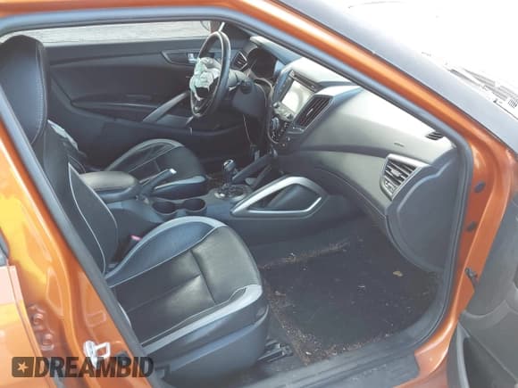 ✅ 2013 Hyundai Veloster Turbo • VIN: KMHTC6AE4DU113168 • Lot: 43706602. Listed on IAAI with 152,218 mi. Free auction sales archive from the USA and detailed vehicle history report at DreamBid. Image 5.