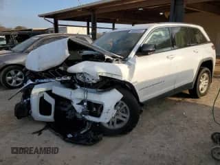 2024 Jeep Grand Cherokee Laredo X with VIN 1C4RJGAG5RC264173, listed as a Copart auction lot 45505465 with 7,633 mi miles and Salvage title. Bid and sale history available at DreamBid. Image 1.