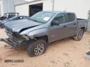 ✅ 2021 GMC Canyon 4WD AT4 • VIN: 1GTG6FENXM1140545 • Lot: 42443919. Wystawiony na IAAI z przebiegiem 121 851 mil. Bezpłatny archiwum sprzedaży aukcyjnych z USA i szczegółowy raport historii pojazdu na DreamBid. Zdjęcie 18.