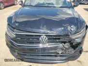 ✅ 2023 Volkswagen Tiguan SE R-Line Black • VIN: 3VVCB7AX8PM142360 • Лот: 69972215. Опубликован ранее на Copart с пробегом 31 837 миль. Бесплатный доступ к архиву аукционных продаж из США и подробный отчёт об истории автомобиля на DreamBid. Изображение 12.