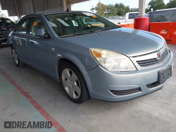 ✅ 2009 Saturn Aura XE • VIN: 1G8ZS57BX9F181795 • Lot: 43812408. Listed on IAAI with 89,222 mi. Free auction sales archive from the USA and detailed vehicle history report at DreamBid. Image 1.