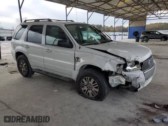 2006 Mercury Mariner Luxury with VIN 4M2CU56136DJ00202, listed as a Copart auction lot 85121264 with 103,242 mi miles and Salvage title. Bid and sale history available at DreamBid. Image 4.