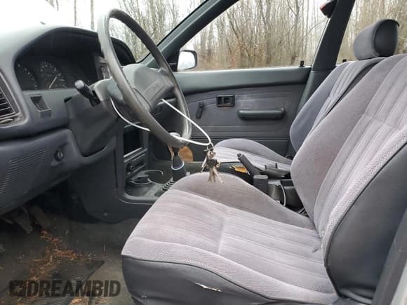 ✅ 1991 Toyota Corolla • VIN: JT2AE94K2M3468301 • Lot: 45797105. Listed on Copart with 284,515 mi. Free auction sales archive from the USA and detailed vehicle history report at DreamBid. Image 7.