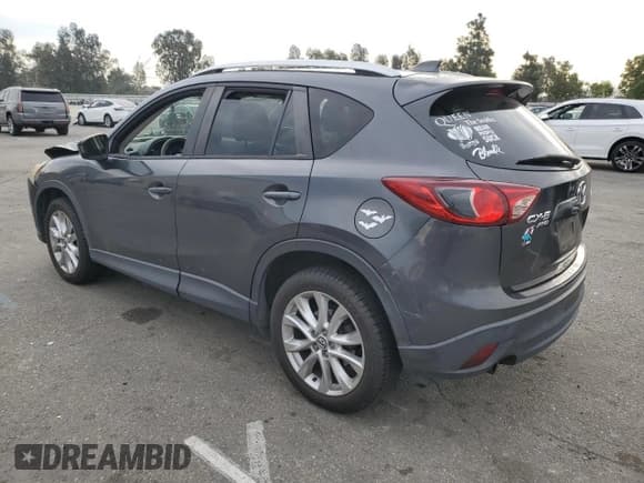 ✅ 2014 Mazda CX-5 Grand Touring • VIN: JM3KE4DY1E0404392 • Lot: 85432315. Listed on Copart with 94,791 mi. Free auction sales archive from the USA and detailed vehicle history report at DreamBid. Image 2.
