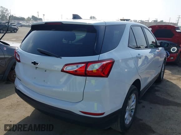 ✅ 2021 Chevrolet Equinox LS • VIN: 3GNAXHEV5MS130154 • Lot: 43536248. Listed on IAAI with 39,052 mi. Free auction sales archive from the USA and detailed vehicle history report at DreamBid. Image 4.