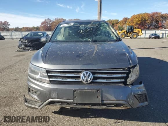 ✅ 2020 Volkswagen Tiguan S • VIN: 3VV0B7AX9LM144292 • Lot: 90301325. Listed on Copart with 99,999 mi. Free auction sales archive from the USA and detailed vehicle history report at DreamBid. Image 5.