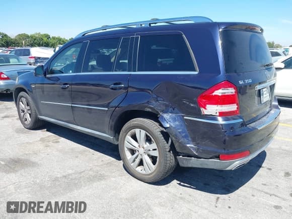 ✅ 2012 Mercedes-Benz GL 350 • VIN: 4JGBF2FEXCA776247 • Lot: 41837519. Listed on IAAI with 119,421 mi. Free auction sales archive from the USA and detailed vehicle history report at DreamBid. Image 3.