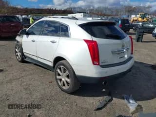 ✅ 2015 Cadillac SRX Premium Collection • VIN: 3GYFNGE36FS550015 • Lot: 43626400. Listed on IAAI with 88,619 mi. Free auction sales archive from the USA and detailed vehicle history report at DreamBid. Image 3.