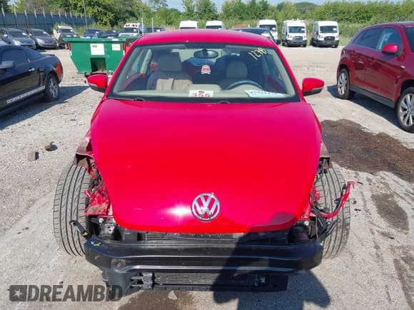 ✅ 2014 Volkswagen Beetle 2.0L TDI w/Sun/Sound/Nav • VIN: 3VWJL7AT6EM634671 • Лот: 42921278. Опубликован ранее на IAAI с пробегом 48 985 миль. Бесплатный доступ к архиву аукционных продаж из США и подробный отчёт об истории автомобиля на DreamBid. Изображение 13.