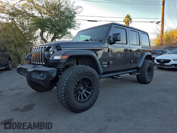 ✅ 2018 Jeep Wrangler Unlimited Sport S • VIN: 1C4HJXDG5JW140981 • Lot: 95802965. Listed on Copart with 60,978 mi. Free auction sales archive from the USA and detailed vehicle history report at DreamBid. Image 2.