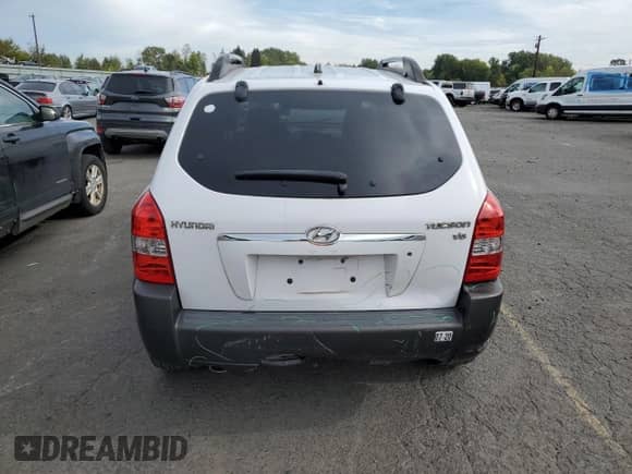 2005 Hyundai Tucson GLS z VIN KM8JN12D75U072157, wystawiony jako Copart lot #75061184 z przebiegiem 224 031 mil mil oraz Szkoda całkowita • Salvage title. Historia ofert i sprzedaży dostępna na DreamBid. Obrazek 6.