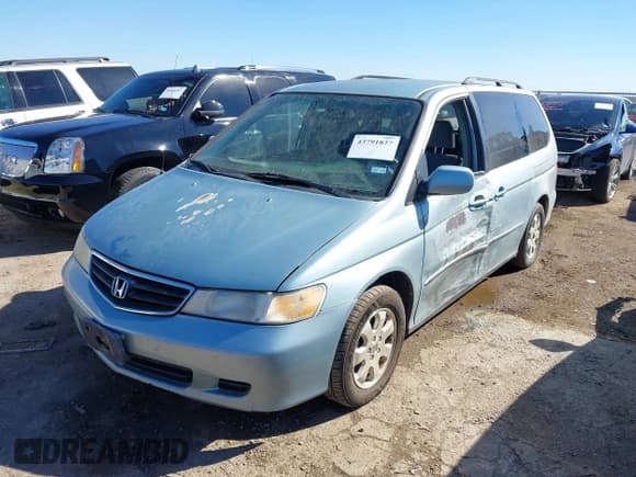 ✅ 2003 Honda Odyssey EX • VIN: 5FNRL18683B074057 • Lot: 43791827. Listed on IAAI with 326,201 mi. Free auction sales archive from the USA and detailed vehicle history report at DreamBid. Image 2.