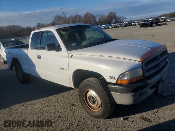 ✅ 1999 Dodge Dakota SLT • VIN: 1B7GG22X2XS112667 • Lot: 81328274. Wystawiony na Copart z przebiegiem Nie podano. Bezpłatny archiwum sprzedaży aukcyjnych z USA i szczegółowy raport historii pojazdu na DreamBid. Zdjęcie 4.