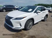 ✅ 2022 Lexus RX 450h • VIN: 2T2JGMDA7NC085504 • Lot: 42201846. Listed on IAAI with 47,659 mi. Free auction sales archive from the USA and detailed vehicle history report at DreamBid. Image 2.