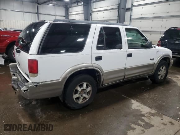 ✅ 2001 Oldsmobile Bravada • VIN: 1GHDT13W512149342 • Lot: 85990994. Listed on Copart with 212,936 mi. Free auction sales archive from the USA and detailed vehicle history report at DreamBid. Image 3.
