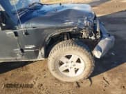 ✅ 2007 Jeep Wrangler Sahara • VIN: 1J8FA54147L171035 • Лот: 43567952. Опубликован ранее на IAAI с пробегом 280 755 миль. Бесплатный доступ к архиву аукционных продаж из США и подробный отчёт об истории автомобиля на DreamBid. Изображение 6.
