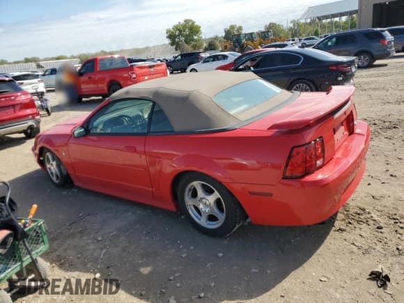 ✅ 2003 Ford Mustang Deluxe • VIN: 1FAFP44413F386140 • Lot: 85580595. Listed on Copart with 96,580 mi. Free auction sales archive from the USA and detailed vehicle history report at DreamBid. Image 2.