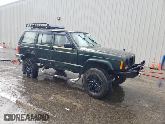 ✅ 1997 Jeep Cherokee SE • VIN: 1J4FJ28S5VL509588 • Lot: 56181695. Wystawiony na Copart z przebiegiem 313 430 mil. Bezpłatny archiwum sprzedaży aukcyjnych z USA i szczegółowy raport historii pojazdu na DreamBid. Zdjęcie 4.