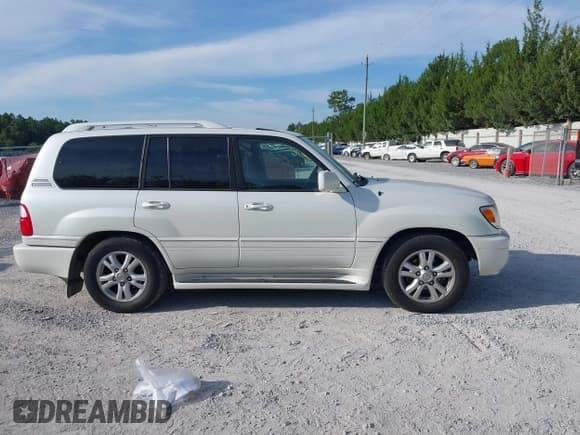 ✅ 2005 Lexus LX 470 • VIN: JTJHT00W754000878 • Lot: 42727042. Wystawiony na IAAI z przebiegiem 263 799 mil. Bezpłatny archiwum sprzedaży aukcyjnych z USA i szczegółowy raport historii pojazdu na DreamBid. Zdjęcie 13.
