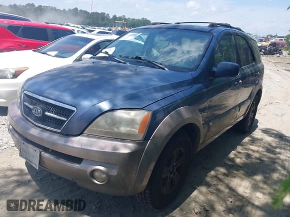 ✅ 2003 Kia Sorento LX • VIN: KNDJD733935098251 • Lot: 42318182. Listed on IAAI with 147,078 mi. Free auction sales archive from the USA and detailed vehicle history report at DreamBid. Image 2.