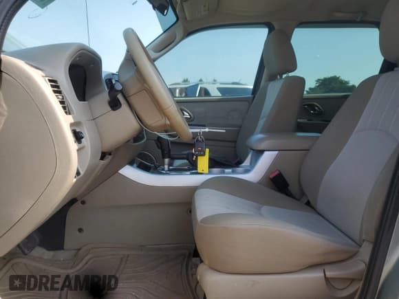 ✅ 2007 Mercury Mariner Convenience • VIN: 4M2YU80Z77KJ00626 • Лот: 59371015. Опубликован ранее на Copart с пробегом 132 586 миль. Бесплатный доступ к архиву аукционных продаж из США и подробный отчёт об истории автомобиля на DreamBid. Изображение 7.