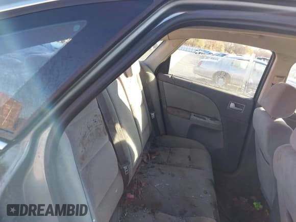 ✅ 2005 Ford Five Hundred SEL • VIN: 1FAFP24135G145056 • Lot: 43914523. Wystawiony na IAAI z przebiegiem Nie podano. Bezpłatny archiwum sprzedaży aukcyjnych z USA i szczegółowy raport historii pojazdu na DreamBid. Zdjęcie 8.