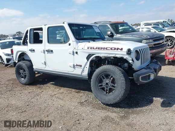 ✅ 2023 Jeep Wrangler Rubicon • VIN: 1C4HJXFG1PW600353 • Lot: 43338003. Listed on IAAI with 26,306 mi. Free auction sales archive from the USA and detailed vehicle history report at DreamBid. Image 1.