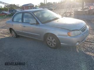 ✅ 2003 Kia Spectra • VIN: KNAFB121835260389 • Lot: 43078415. Wystawiony na IAAI z przebiegiem 106 740 mil. Bezpłatny archiwum sprzedaży aukcyjnych z USA i szczegółowy raport historii pojazdu na DreamBid. Zdjęcie 1.