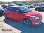 2016 Hyundai Veloster z VIN KMHTC6AD9GU282761, wystawiony jako IAAI lot #43624975 z przebiegiem 126 546 mil mil oraz . Historia ofert i sprzedaży dostępna na DreamBid. Obrazek 1.