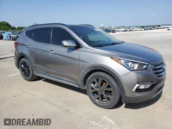 ✅ 2017 Hyundai Santa Fe Ultimate • VIN: 5XYZW4LA8HG401688 • Лот: 53872964. Опубликован ранее на Copart с пробегом 117 274 миль. Бесплатный доступ к архиву аукционных продаж из США и подробный отчёт об истории автомобиля на DreamBid. Изображение 4.