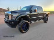 ✅ 2015 Ford F-250 Lariat • VIN: 1FT7W2BT9FEC80321 • Lot: 62563965. Listed on Copart with 128,581 mi. Free auction sales archive from the USA and detailed vehicle history report at DreamBid. Image 2.