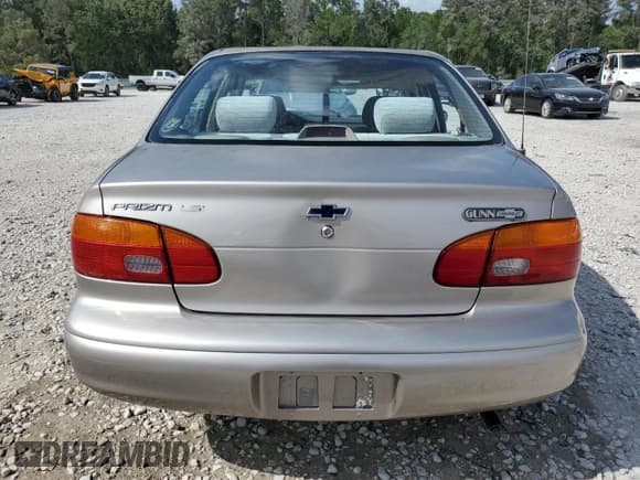 ✅ 2002 Chevrolet Prizm • VIN: 1Y1SK52872Z402630 • Lot: 53581255. Listed on Copart with 98,104 mi. Free auction sales archive from the USA and detailed vehicle history report at DreamBid. Image 6.