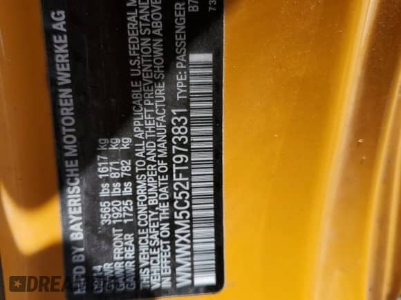 2015 MINI Hardtop with VIN WMWXM5C52FT973831, listed as a Copart auction lot 68501305 with 188,622 mi miles and Salvage title. Bid and sale history available at DreamBid. Image 12.