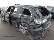 ✅ 2015 Jeep Grand Cherokee Overland • VIN: 1C4RJFCG3FC665854 • Lot: 41697999. Listed on IAAI with 206,618 mi. Free auction sales archive from the USA and detailed vehicle history report at DreamBid. Image 3.