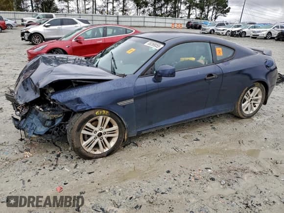 ✅ 2008 Hyundai Tiburon GS • VIN: KMHHM66D18U295677 • Лот: 95269055. Опубликован ранее на Copart с пробегом 252 592 миль. Бесплатный доступ к архиву аукционных продаж из США и подробный отчёт об истории автомобиля на DreamBid. Изображение 1.