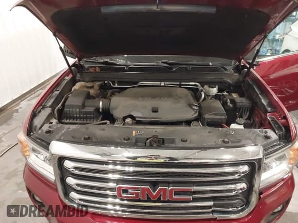 ✅ 2018 GMC Canyon 4WD SLE • VIN: 1GTG6CEN1J1174643 • Лот: 43660608. Опубликован ранее на IAAI с пробегом 83 972 миль. Бесплатный доступ к архиву аукционных продаж из США и подробный отчёт об истории автомобиля на DreamBid. Изображение 10.