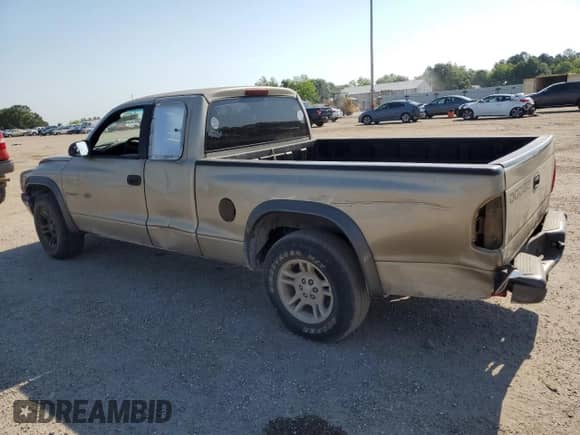 2002 Dodge Dakota с VIN 1B7GL12X02S545788, выставлен на аукционе Copart как лот 69987164 с пробегом 247 912 миль миль и Списание • Salvage title. История ставок и продаж доступна на DreamBid. Изображение 2.