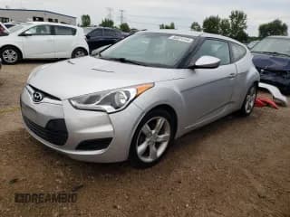 ✅ 2013 Hyundai Veloster w/Gray Int • VIN: KMHTC6AD5DU136899 • Lot: 66874144. Wystawiony na Copart z przebiegiem 89 446 mil. Bezpłatny archiwum sprzedaży aukcyjnych z USA i szczegółowy raport historii pojazdu na DreamBid. Zdjęcie 1.