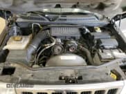 ✅ 2010 Jeep Commander Sport • VIN: 1J4RG4GK9AC158400 • Lot: 53497035. Listed on Copart with 153,309 mi. Free auction sales archive from the USA and detailed vehicle history report at DreamBid. Image 12.