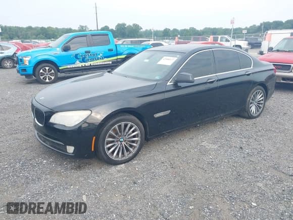✅ 2012 BMW 7 Series 740i • VIN: WBAKA4C55CC613283 • Lot: 42908577. Listed on IAAI with 159,000 mi. Free auction sales archive from the USA and detailed vehicle history report at DreamBid. Image 2.