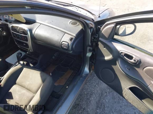 2005 Dodge Neon SXT z VIN 1B3ES56C05D119361, wystawiony jako IAAI lot #42132604 z przebiegiem Nie podano mil oraz . Historia ofert i sprzedaży dostępna na DreamBid. Obrazek 5.