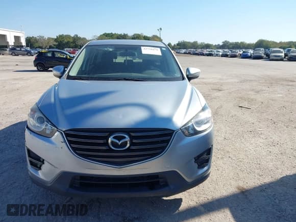 ✅ 2016 Mazda CX-5 Sport • VIN: JM3KE2BY9G0650696 • Lot: 43758478. Wystawiony na IAAI z przebiegiem 123 501 mil. Bezpłatny archiwum sprzedaży aukcyjnych z USA i szczegółowy raport historii pojazdu na DreamBid. Zdjęcie 12.