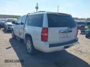 ✅ 2011 Chevrolet Suburban LT • VIN: 1GNSCJE02BR187519 • Lot: 43136755. Listed on IAAI with 203,141 mi. Free auction sales archive from the USA and detailed vehicle history report at DreamBid. Image 3.