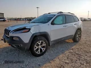 ✅ 2014 Jeep Cherokee Trailhawk • VIN: 1C4PJMBB1EW235173 • Lot: 81557235. Wystawiony na Copart z przebiegiem 185 966 mil. Bezpłatny archiwum sprzedaży aukcyjnych z USA i szczegółowy raport historii pojazdu na DreamBid. Zdjęcie 1.