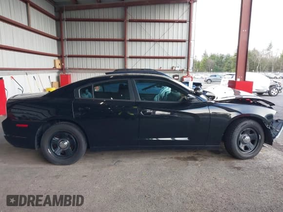 ✅ 2014 Dodge Charger Police • VIN: 2C3CDXAG3EH223713 • Lot: 43698088. Listed on IAAI with 110,336 mi. Free auction sales archive from the USA and detailed vehicle history report at DreamBid. Image 14.