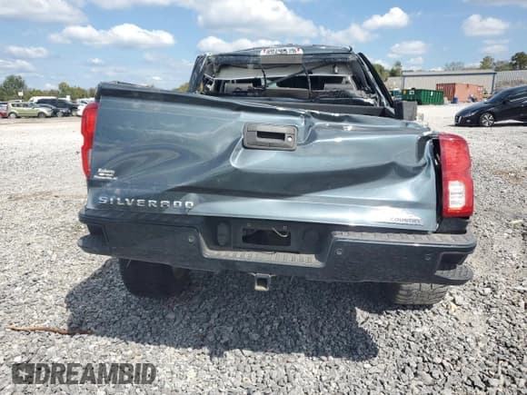 ✅ 2018 Chevrolet Silverado 1500 High Country • VIN: 3GCUKTEJ5JG438198 • Лот: 84261335. Опубликован ранее на Copart с пробегом 91 664 миль. Бесплатный доступ к архиву аукционных продаж из США и подробный отчёт об истории автомобиля на DreamBid. Изображение 6.